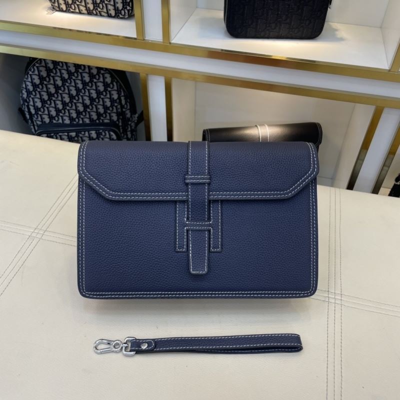 H**mes clutch bags